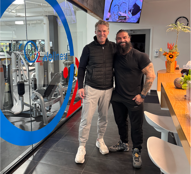 Dr. Darren Burke with a fellow entrepreneur and friend he first met 25 years ago.
